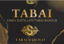 Brand label reading TABAI LINEA DISTILLATI TABAI BAROLO with a gold dragon emblem on a dark background.